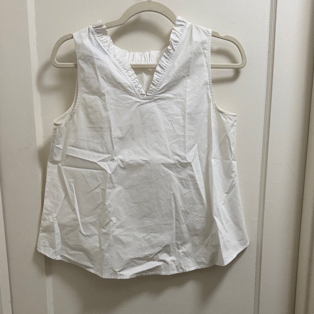 HD in Paris Ivory Sleeveless Ruffle Top